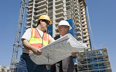 Contractor and Engineer Discussing